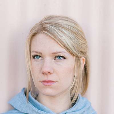 Professional property manager reviewing tenant screening documents